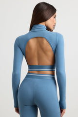 Backless Turtleneck Long-Sleeve Crop Top in Steel Blue