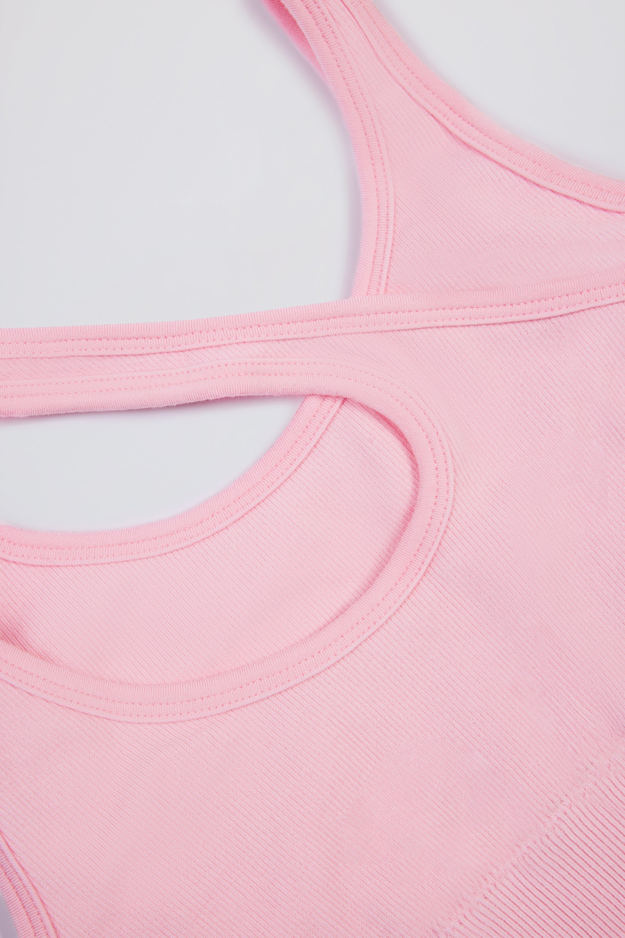 Seamless Soft Rib Asymmetric Sports Bra in Powder Pink