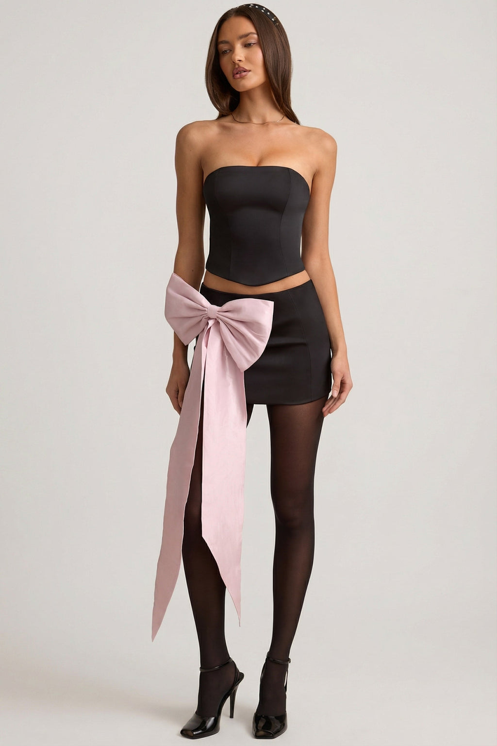 Satin Bow-Detail Low-Rise Mini Skirt in Black