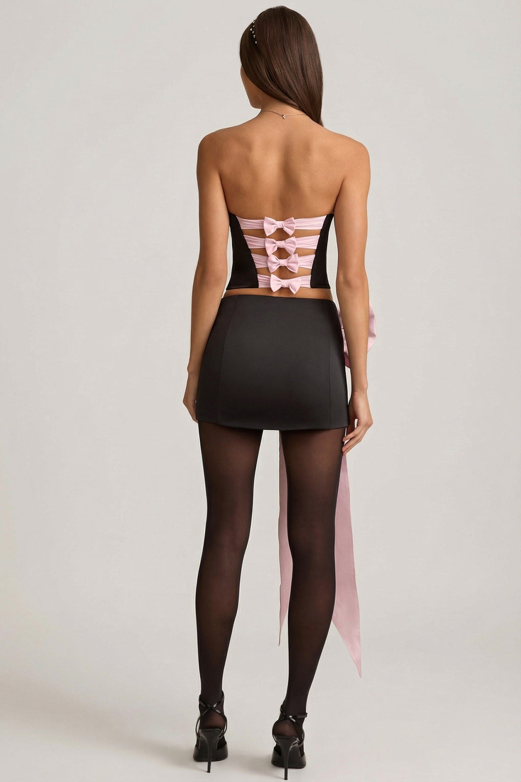 Satin Bow-Detail Low-Rise Mini Skirt in Black